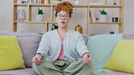 Meditation, lotus and black woman on couch for stress management, balance and peace with spiritual healing. Calm, zen and gen z person or student meditate, yoga or breathing on sofa in living room