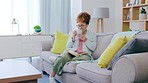 Living room, book reading and black woman with morning coffee at home feeling calm. Relax, female student and lounge of a young person on a couch with college textbook and peace with books in house