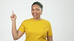 Woman, face and hands pointing with smile on mockup for product placement or advertising against white studio background. Portrait of happy female showing finger sign or point in announcement or news