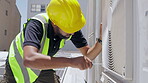 Air conditioning, roof and technician man repair, maintenance and working on fan or aircon power generator. Electrician person, handyman or contractor tools, screwdriver and industry labor services