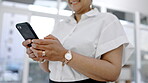 Hands, business woman and texting on smartphone for web app, planning or internet search. Closeup worker, mobile technology and online connection for typing data, networking or contact chat in office