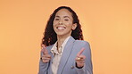 Face, laughing and business woman pointing to you in studio isolated on an orange background. Comic, emoji and smile of happy female professional gesturing for winner, decision or success choice.