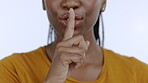 Secret, face and black woman with finger on lips in studio, background and privacy. Female model with silence hands on mouth for quiet, shush sign and gossip of whisper, silent emoji or mystery voice