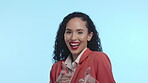 Face, finger gun and black woman with success, celebration and achievement against a blue studio background. Portrait, Jamaican female and happy lady with gesture for shooting, happiness and pointing