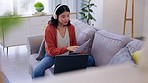 Entrepreneur, Asian woman and laptop with headphones, lounge and document for planning, success and reading. Female employee, business owner and lady with device, headset or streaming music for focus