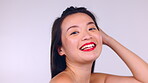 Asian, woman and face in studio for makeup, hair and skincare cosmetics by background for wellness. Happy gen z model, cosmetic girl portrait and healthy glow on skin for natural aesthetic beauty