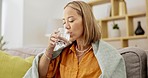 Asian woman, drinking water with pills and sick with health, vitamins and hydration, medicine and wellness. Healthcare, prescription drugs and illness with young female at home and daily supplement