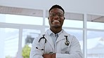 Doctor face, black man and proud in a medical, healthcare and wellness hospital. Portrait, happiness and smile of a health worker employee from Nigeria ready for clinic development and management