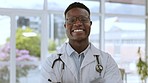 Doctor face, black man and proud in a medical, healthcare and wellness hospital. Portrait, happiness and smile of a health worker employee from Nigeria ready for clinic development and management