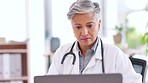 Mature, doctor or laptop for hospital planning, medical research or life insurance application. Woman, healthcare or worker on technology for email prescription, wellness consulting or typing results