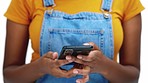 Black woman, phone call and communication with connection and happy isolated on white background. Technology, hands and scroll on smartphone, excited and young gen z female with conversation start