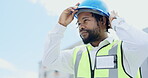 Black man, engineer and safety helmet in the city for construction, building or ready in planning at site. African male contractor with hard hat in preparation for industrial work on rooftop in town