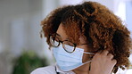 Black woman, doctor and removing face mask for end of covid with smile in relief at hospital. Portrait of happy African American female afro in healthcare ready for medical services in post pandemic