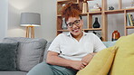 Face, black woman and smile on sofa in living room, lounge and apartment for easy lifestyle, weekend and relax. Portrait of happy female with glasses on couch in house, home and happiness in Atlanta