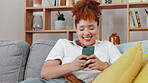 Black woman, smartphone and smile on couch, lounge and reading funny social media post, online chat and meme. Portrait of laughing female typing on cellphone in house, mobile download with technology