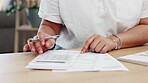 Hands, calculator and accountant calculating and working in an office capture financial data on a computer in an office. Closeup, tax and calculation by business person with profit for accounting 