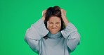 Woman, green screen and angry with pulling hair in studio for mental health, anxiety and shouting. Frustrated model, stress and psychology problem with trauma, bipolar or schizophrenia by background