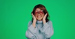 Silly woman portrait, green screen and sunglasses of a young female with happiness in a studio. Isolated, smiling model and joy of a person feeling comic, funny and cheerful with excitement and humor