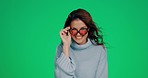 Cool, green screen and portrait of a woman with sunglasses isolated on a studio background. Stylish, fashionable and girl posing, modeling and wearing fun eyewear on a mockup backdrop with space