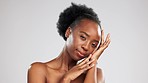 Black woman, studio and face with beauty, skincare and wellness for happiness by gray background. Gen z model, african and portrait for cosmetics, makeup or natural aesthetic for healthy glow on skin