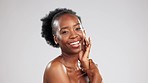 Health, body care and face of a black woman in studio with a epilation, hair removal or shaving routine. Wellness, self care and female model feeling glowing, healthy and soft skin by gray background