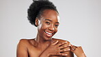 Black woman, face and beauty, laughter and skincare, happiness with glow on studio background. Healthy skin, portrait and dermatology with happy female, hands with natural cosmetics and mockup space