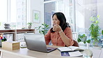 Laptop, covid and tissue with a business asian woman blowing her nose while working alone in her office. Computer, sneeze and allergies with a female employee suffering from a cold or flu at work