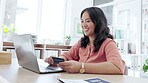 Asian woman, laptop and credit card with smile in ecommerce success or online shopping at office desk. Happy businesswoman on computer for internet banking, purchase or transaction at the workplace