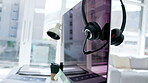 Call center, headset and computer screen for desktop support or customer service on office desk. Contact us, equipment or tools for consulting, telemarketing or PC Helpdesk advice at the workplace