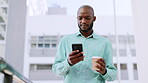 Black man, phone and walking with coffee in city for communication, social media and 5g network. Business person outdoor with smartphone while typing or writing email or chat for urban street travel