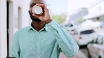 Black man, coffee and walking with a phone in city for communication, break and 5g network. Business person outdoor with smartphone and disposable cup while online on street for urban travel