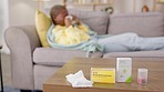 Medicine, sick and woman on the sofa with pills for an allergy, virus or cold. Healthcare, covid and African girl on the couch with medication for a flu, disease or antibiotics for an illness