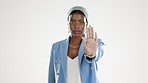 Face, black woman and stop hands in studio, protest and  fighting racism on white background. Serious, palm and portrait of female model with hand gesture, warning ban and rejection of discrimination