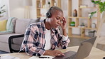 Black woman, call center employee with laptop and headache, stress with remote work and frustrated in home office. CRM, customer support and female agent with fatigue, burnout and contact us