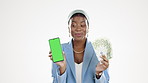 Phone, cash and green screen with a black woman lottery winner in studio isolated on a white background. Money, app and finance with a female holding mobile mockup as a winning investment trader