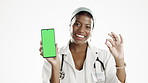 Black woman, doctor and pills, phone and green screen, pharmaceutical and healthcare marketing on white background. Female in health, mockup and medical app with drugs, pharmacy and smile in portrait