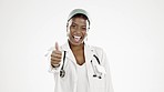 Black woman, doctor and thumbs up in studio portrait studio, smile isolated on white background. Healthcare, happiness and trust, medical professional in agreement and happy to help in health care.