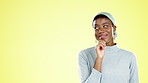 Thinking, looking and black woman with mockup for marketing isolated on a yellow background. Idea, happy and African girl with contemplation about branding, advertising and product placement space