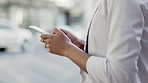 Typing, phone and hands of woman in city for networking, social media app and text message. Technology, internet and website with girl browsing online in town for search,  travel and communication