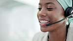 Black woman, call center and consulting in telemarketing, customer service or support at office desk. Happy African female consultant or agent face talking with headset explaining sales in contact us