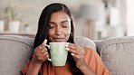 Coffee, happy black woman and morning drink feeling calm and relax thinking on living room sofa. Tea smell, lounge and aroma in home with young person with happiness, smile and peace from gratitude 