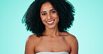 Black woman, face and afro with smile in skincare, cosmetics or beauty against a studio background. Portrait of happy African American female smiling for makeup, spa or cosmetic facial treatment