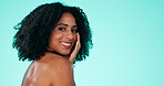 Black woman, face and afro with smile in beauty cosmetics or skincare against a studio background. Portrait of happy African American female smiling for makeup, spa or facial treatment on mockup