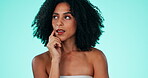 Thinking, face and beauty with a model black woman in studio on a blue background for natural treatment. Idea, skincare and cosmetics with an attractive young female contemplating her skin routine