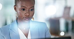 Serious black woman, business and laptop at night for planning online strategy, research and company data. Young female worker working overtime on computer for deadlines, productivity and technology