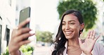 Woman, phone and video call waving in the city for communication, webinar or live streaming outdoors. Happy  businesswoman with smile greeting on smartphone for social media or online chat in town