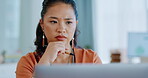 Serious, thinking and woman on computer in office business strategy, planning and career decision. Contemplating, thoughtful and asian person ideas, reading email or proposal analysis on her laptop