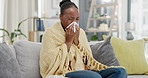 Sick black woman, tissue and flu in home of allergies, cold virus or hayfever illness. Sneeze, nose and female with blanket in house of winter allergy, health problems and covid risk of sinus disease