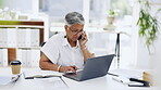 Business woman, laptop and phone call while writing notes, planning schedule or tech ideas in office. Female receptionist working on computer, mobile communication and agenda of online administration