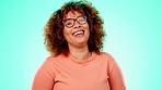 Face, funny and black woman with laughter, joke and happiness against a blue studio background. Portrait, African American female and girl with smile, cheerful and comic with joy, humor and happy